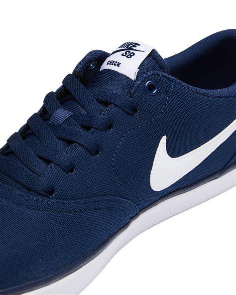 navy nike sneakers for women